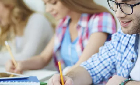 a student taking notes