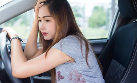 teen in the drivers seat